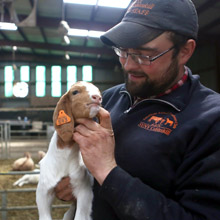 Dirk holding a baby goat