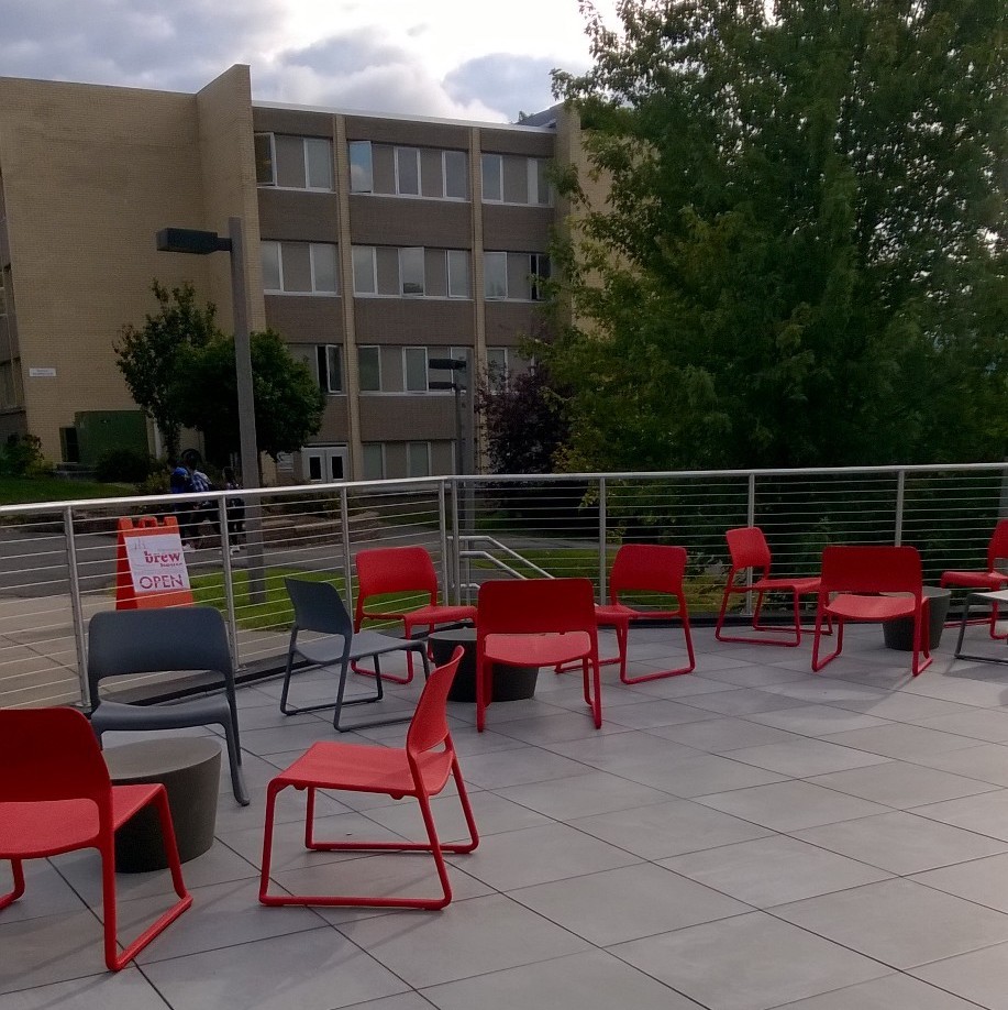 Brick Yard Point Rooftap red chairs